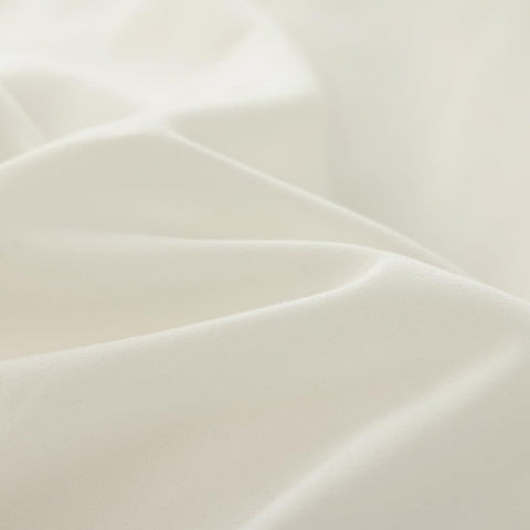 JANZAA Creamy White ruffle design showcased to enhance shabby chic bedroom.