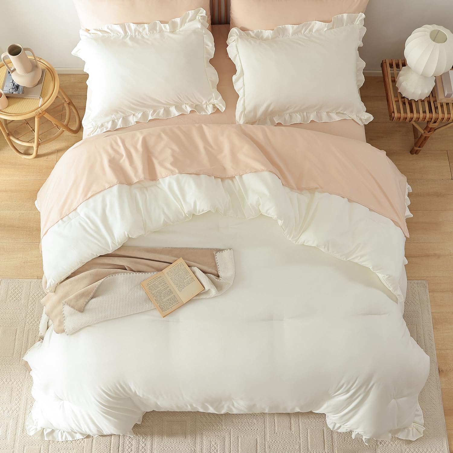 JANZAA Bed setup features creamy white tones and shabby chic ambiance.