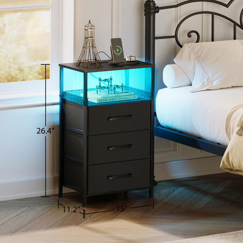 Three fabric drawers keep clutter organized on JARHETUN night stand