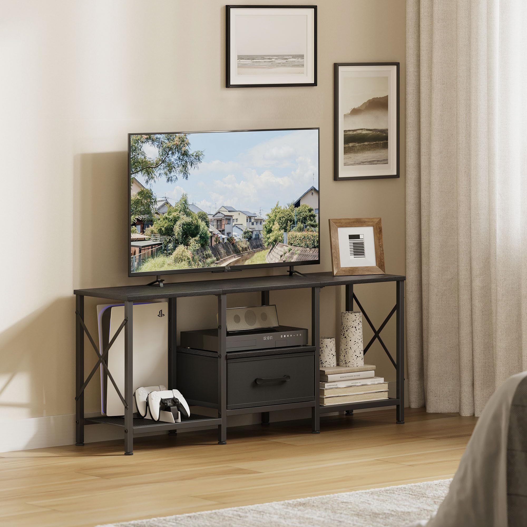 JARHETUN TV Stand fabric drawer keeps remotes and cables neatly stored.