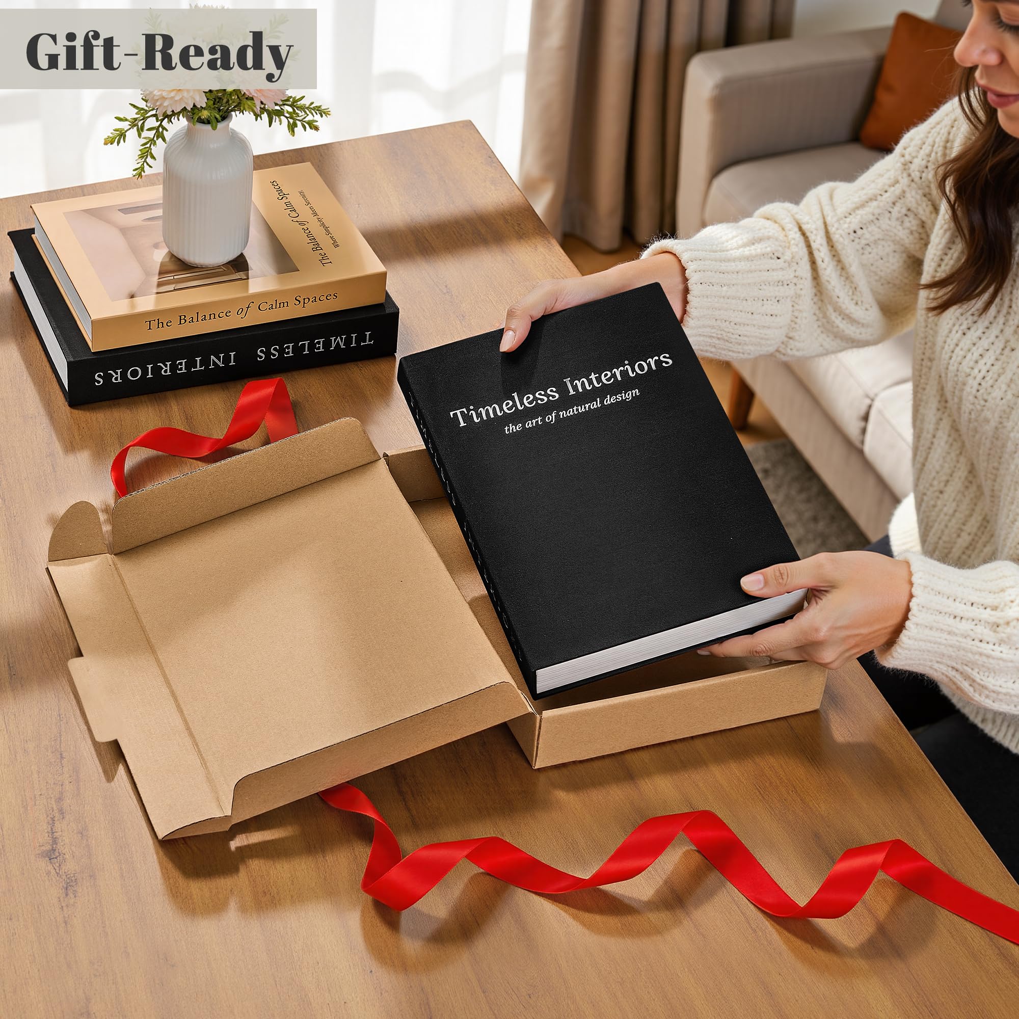Jarlink Decorative Books beside a vase and candle for chic ambience