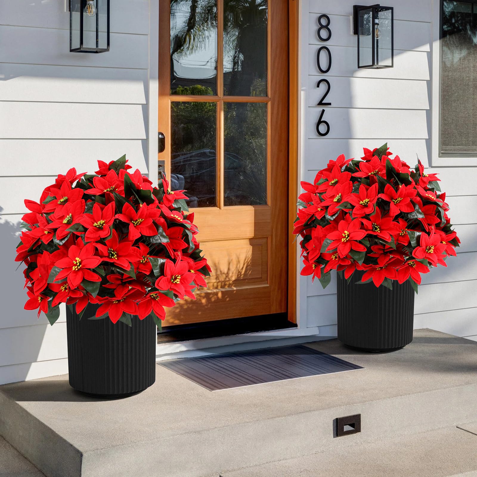Jasmpig poinsettia topiary ball indoors for year-round charm.