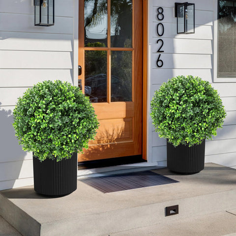 Jasmpig indoor outdoor faux greenery enhancing porch or living space.