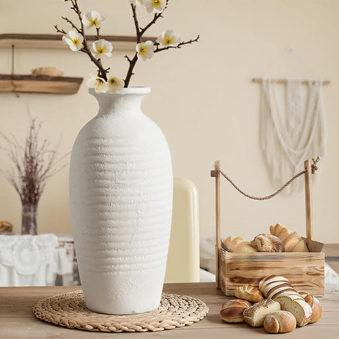 Jaxoriel vase base is non-slip to protect tabletops during display changes.