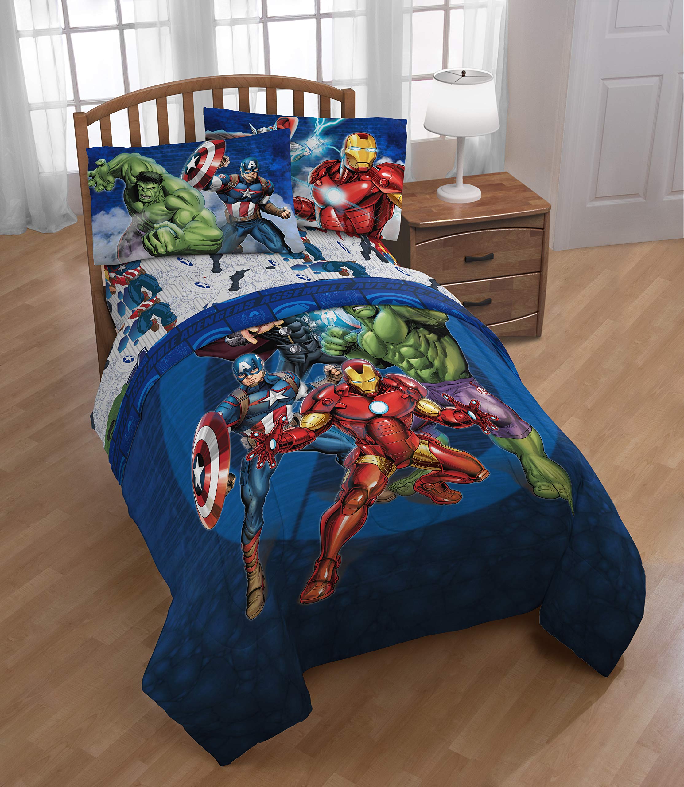 Jay Franco Avengers blue circle bedding set shown with coordinating decor.