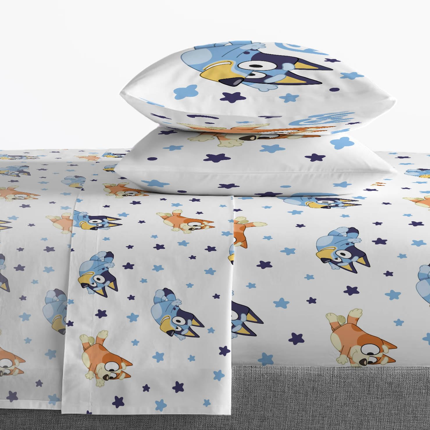Bluey & Bingo pillowcase with clouds and stars for quick bed changes.