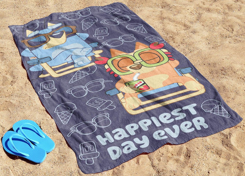 Jay Franco Bluey & Bingo towel laid flat, 28 by 58 inches.