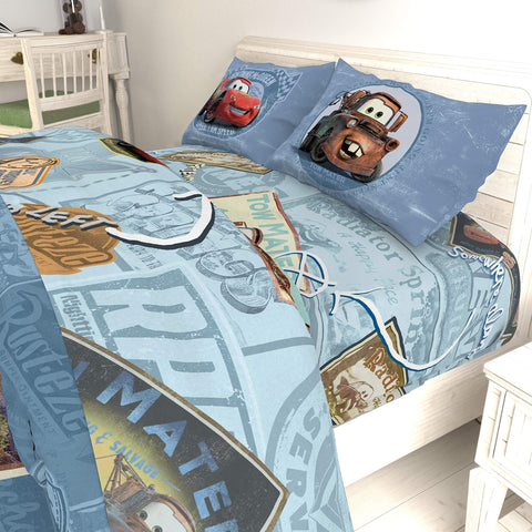 Jay Franco Cars Tune Up radiator springs artwork enhances themed bedroom.