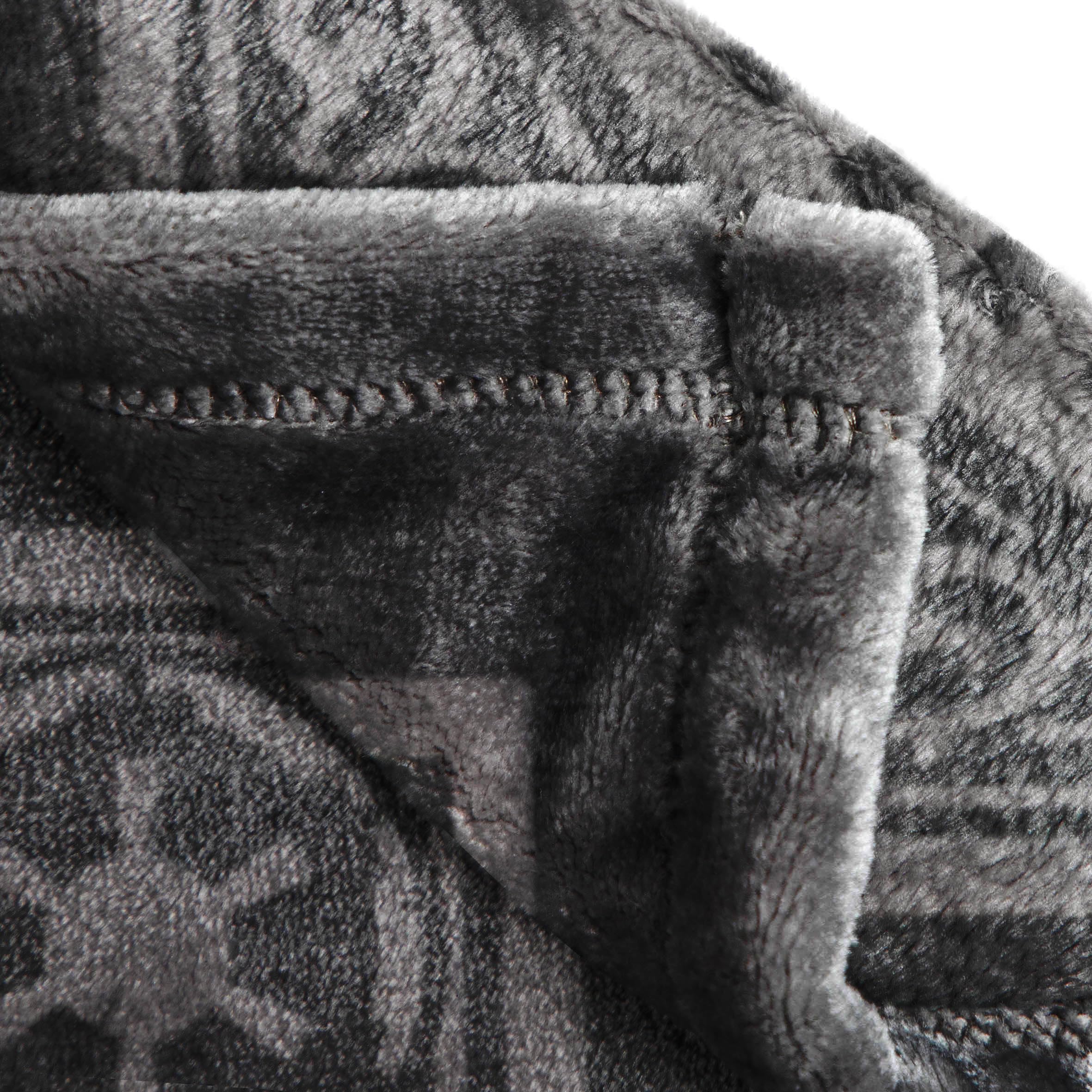 Jay Franco cozy bedroom decor throw draped over a chair
