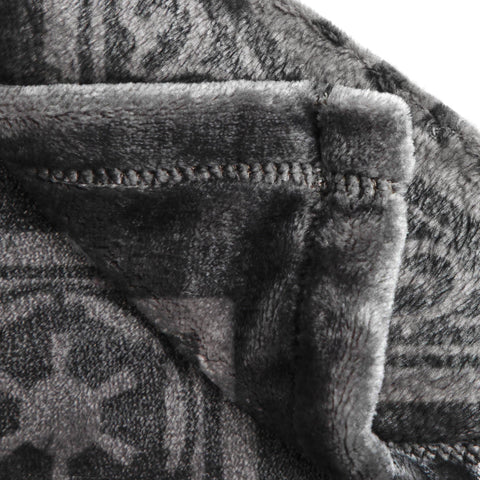 Jay Franco cozy bedroom decor throw draped over a chair