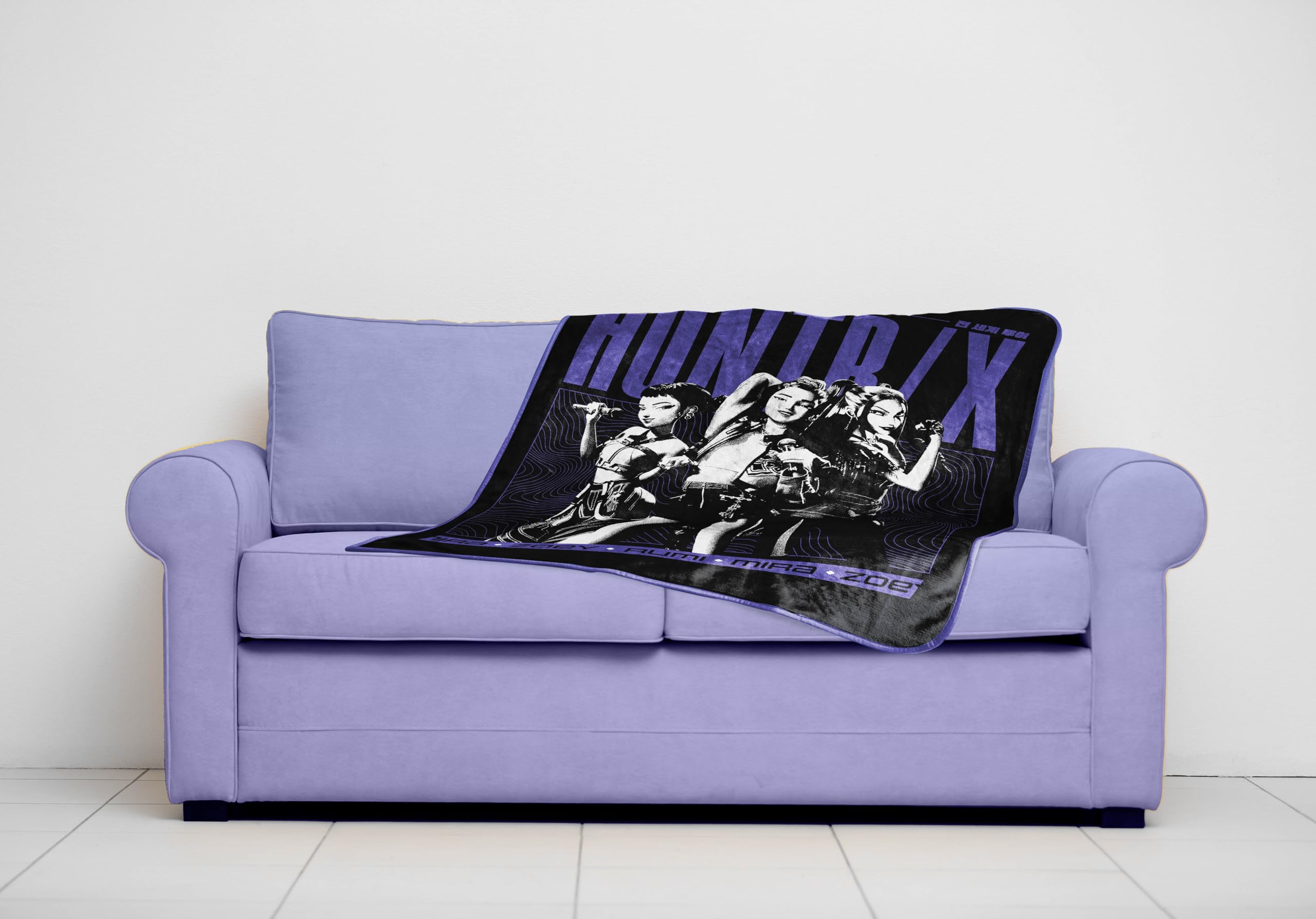 Jay Franco Huntrix throw draped on bed demonstrates cozy layering for Bedtime Comfort.