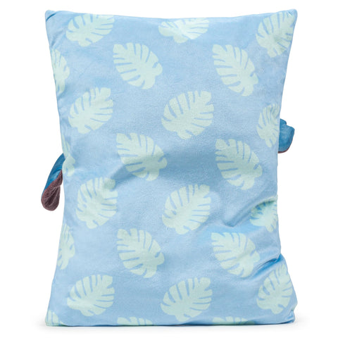 Stitch 3D Snuggle Pillow nestled on a bed as decorative charm.