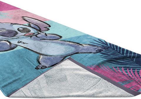 Jay Franco Disney Lilo Stitch towel fabric texture close-up emphasizes plush absorbency after swimming.