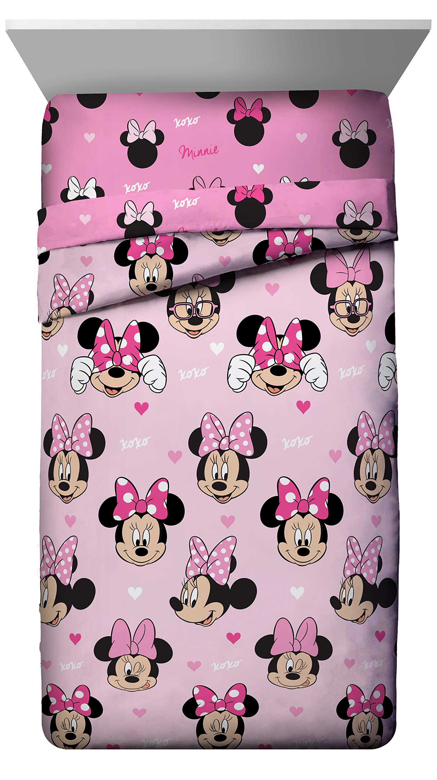 Minnie Mouse hearts and love comforter reversible design showing two looks