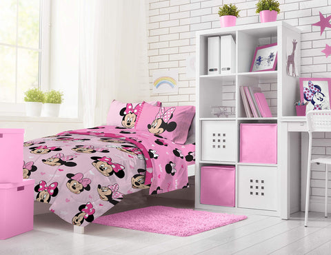 Kid-friendly Minnie Mouse room setup with colorful bedding