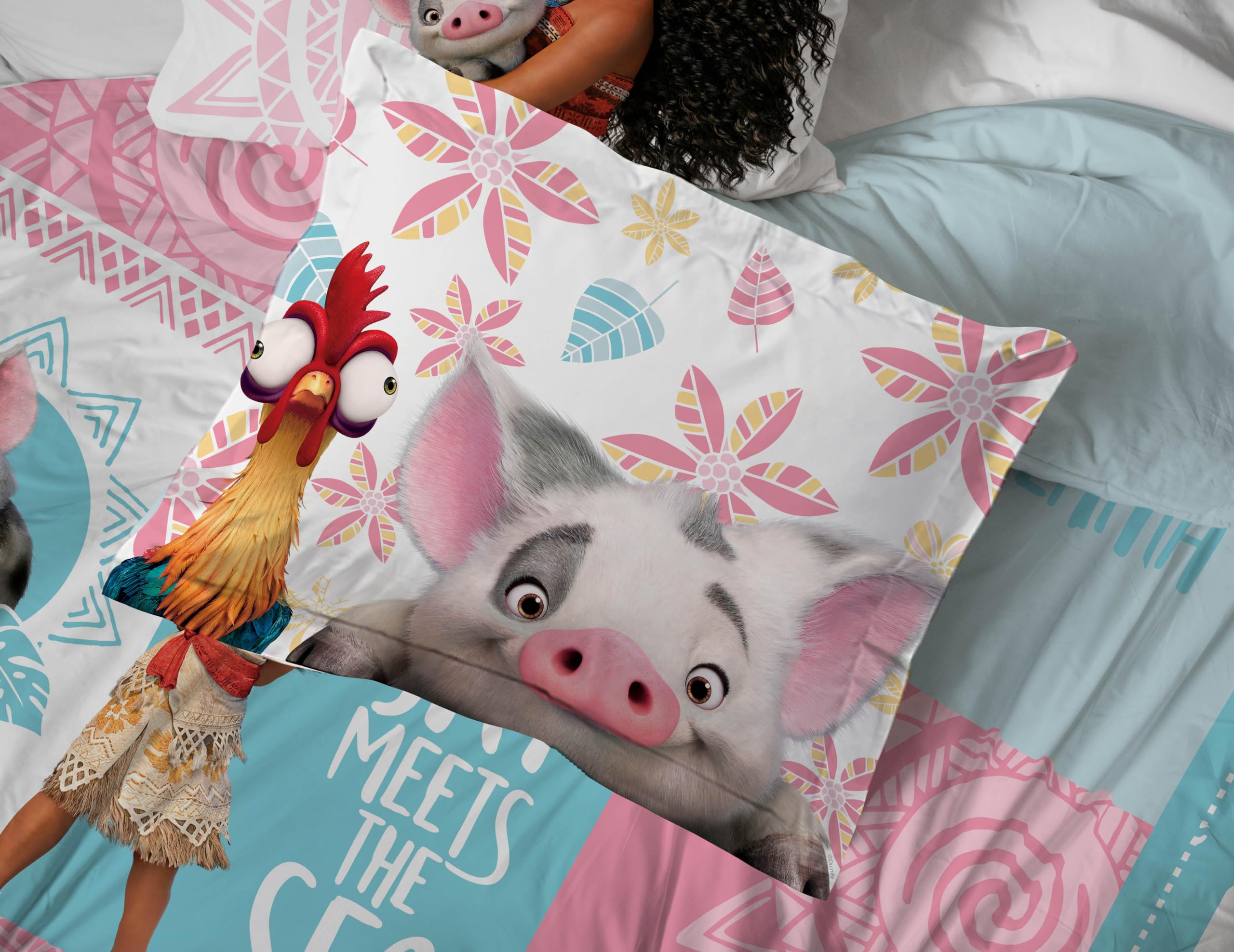 Bright Moana themed twin bed setup in a kid friendly room