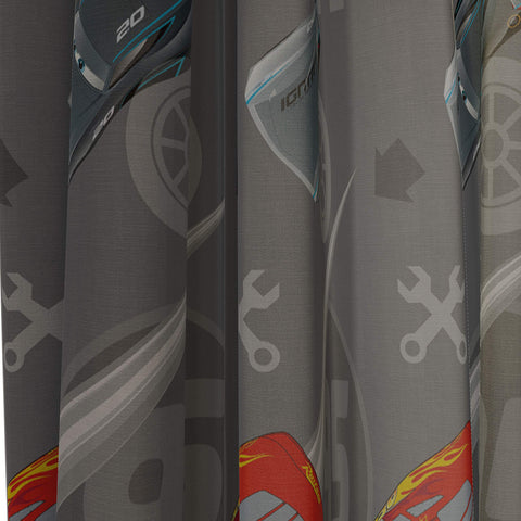 Jay Franco Cars drapes in a kid's room featuring playful decor and easy maintenance.