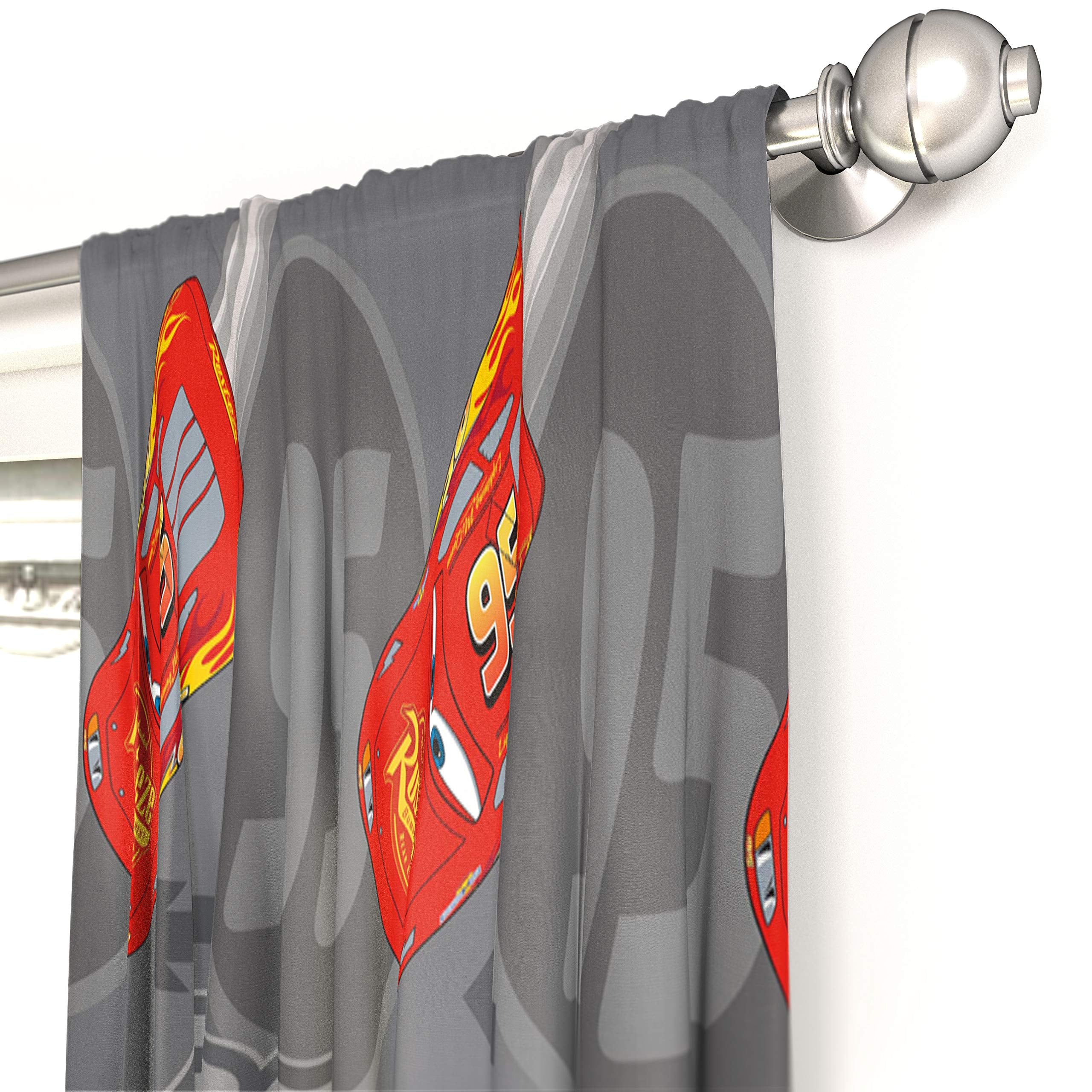 Jay Franco Lightning McQueen drapes include tiebacks for easy opening and light control.