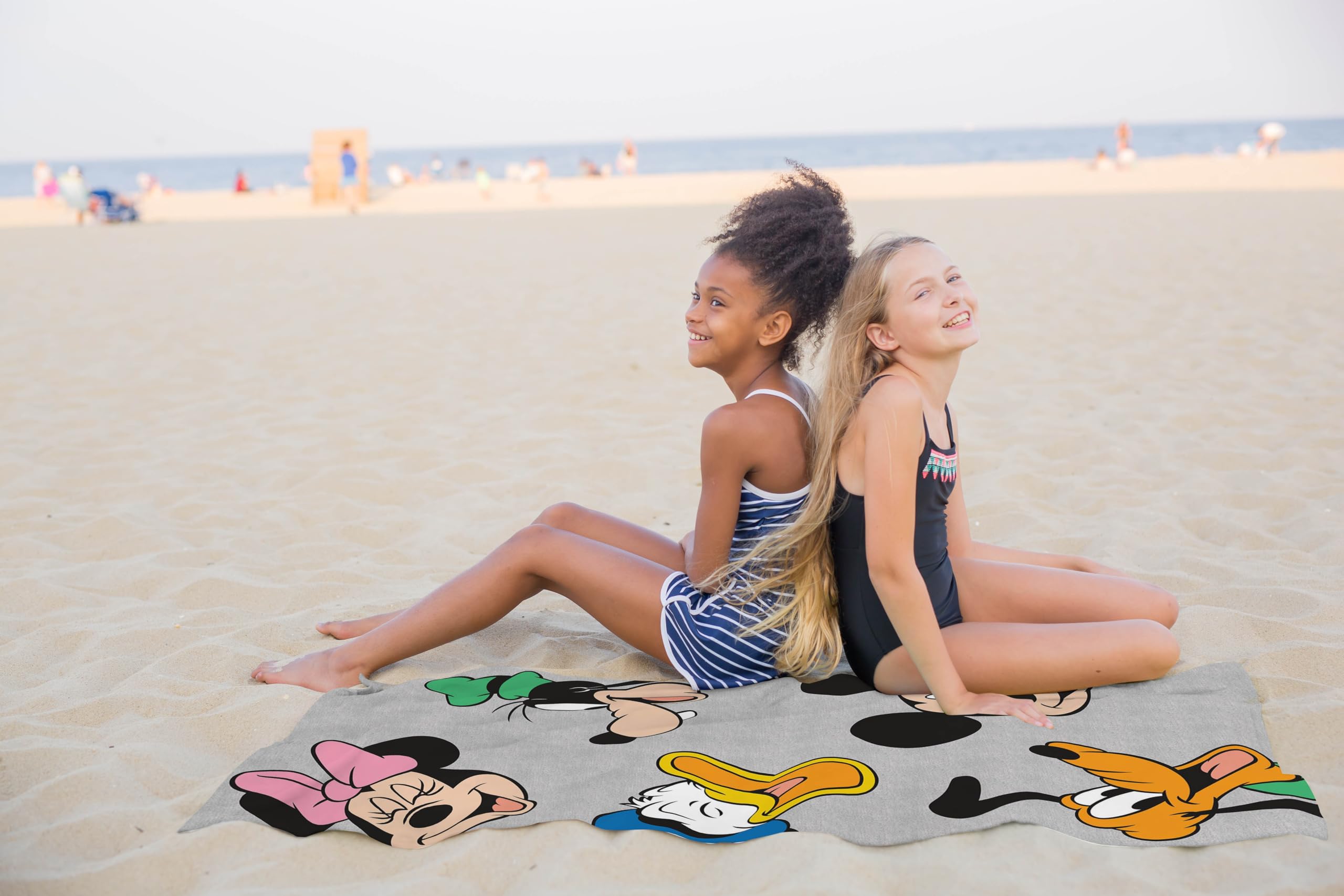 Jay Franco kids bath-time towel in a coordinating Mickey Mouse collection.