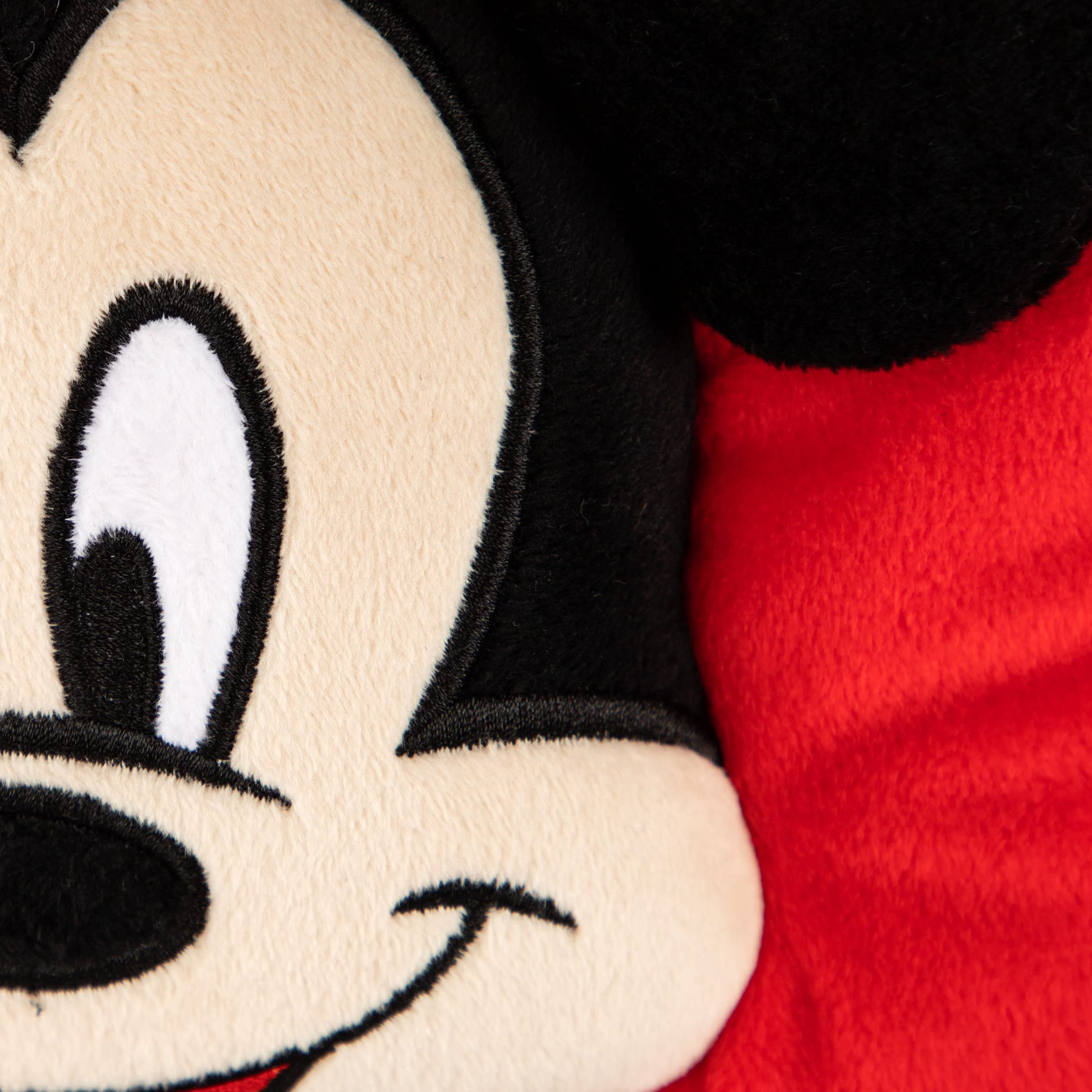Jay Franco Mickey Mouse 3D snuggle pillow in a kid's room adds playful decor.