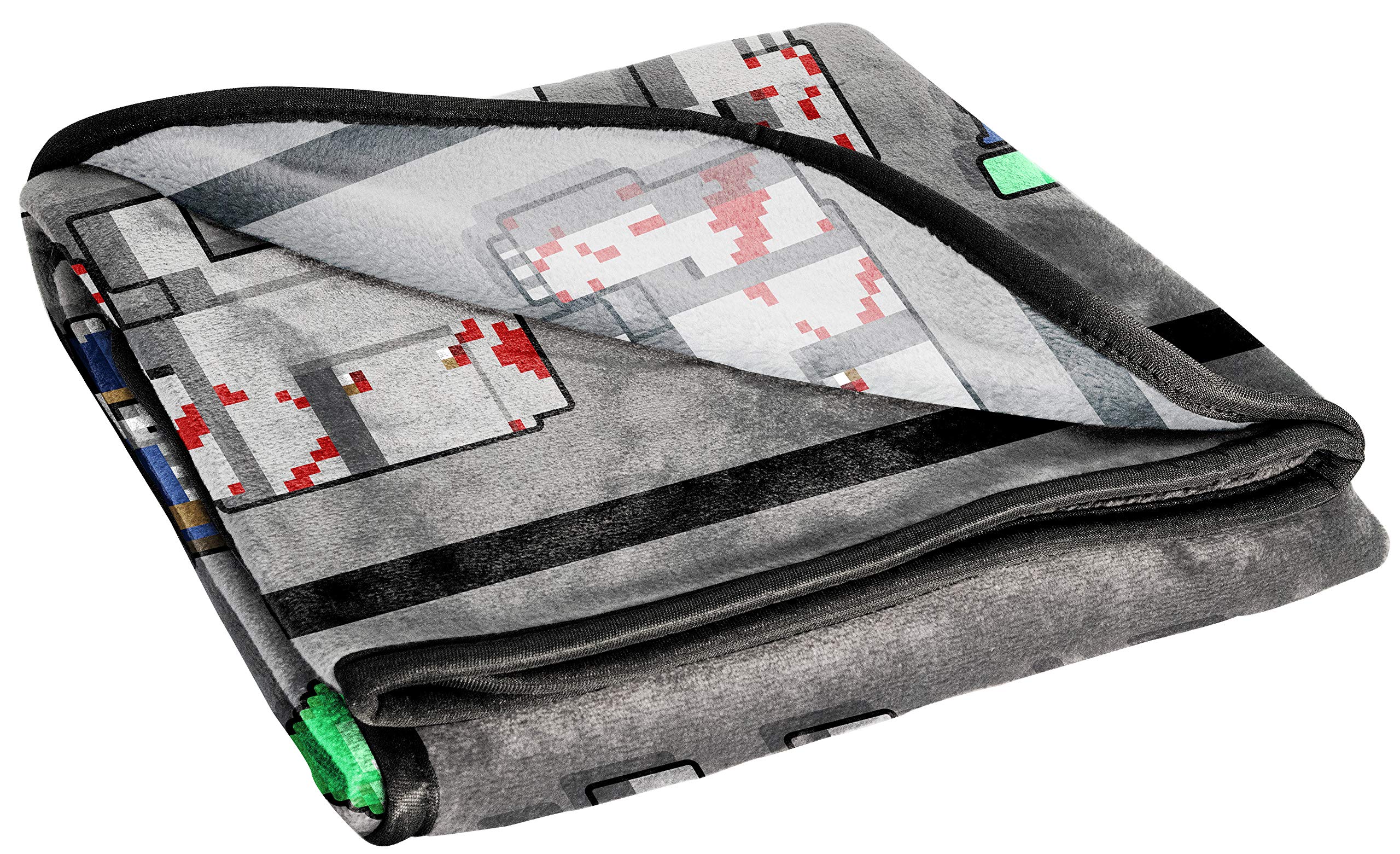 Jay Franco Minecraft Dungeons throw blanket featuring Redstone Golem for cozy playroom decor.