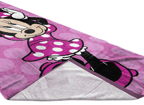 Minnie Mouse design towel by Jay Franco, ideal for pool or beach drying.