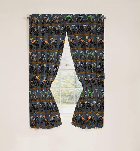 Coordinating Jay Franco Monster Jam bedding enhances the room's theme.