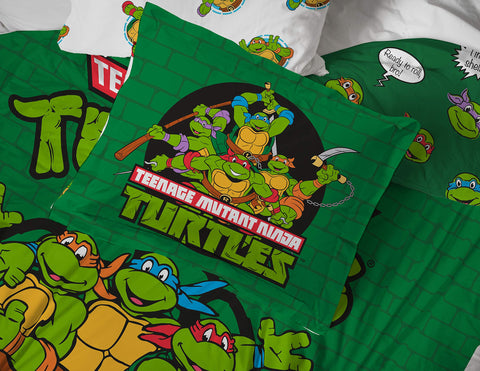 Jay Franco TMNT green bricks bedding on a full bed setup looks vibrant and inviting.
