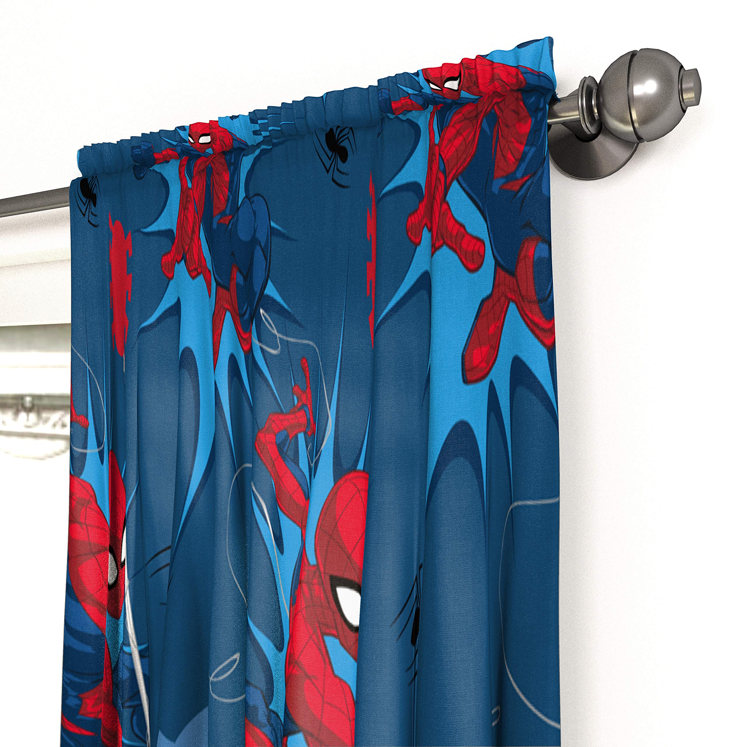 Jay Franco Spiderman drapes in a cozy setup with filtered natural light.