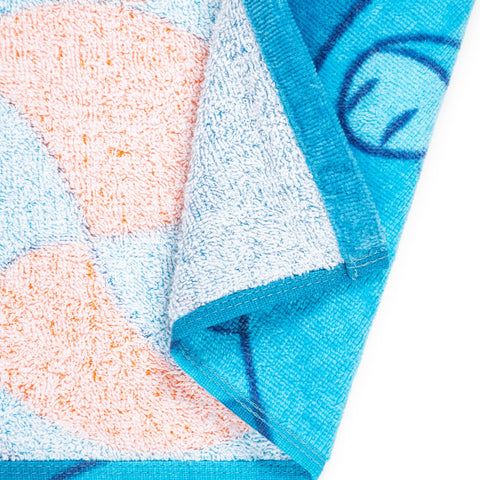 Jay Franco towel ready for swim, pool, or travel in blue.