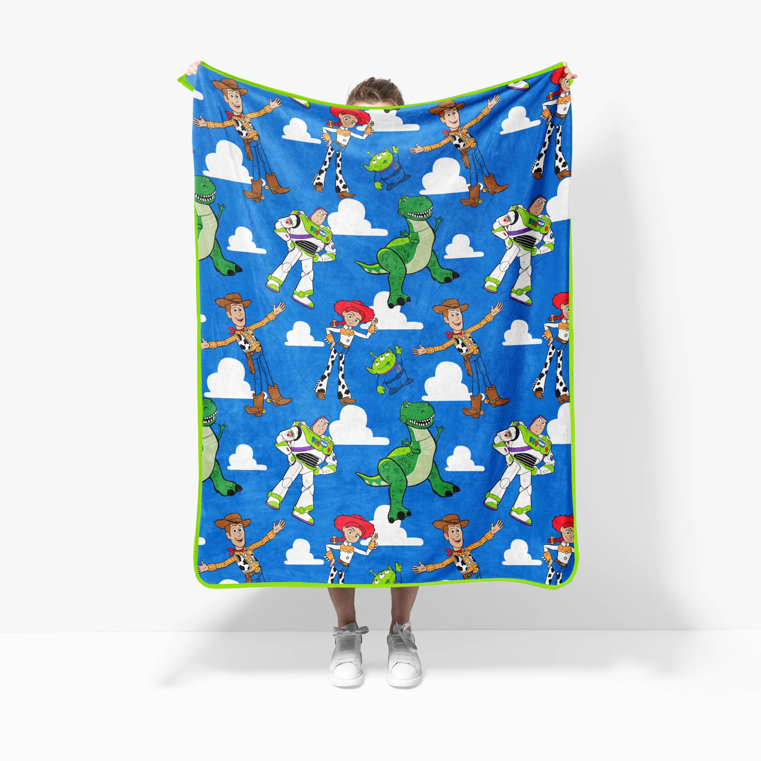Jay Franco Toy Story plush throw durable microfiber for easy care on bed or couch.
