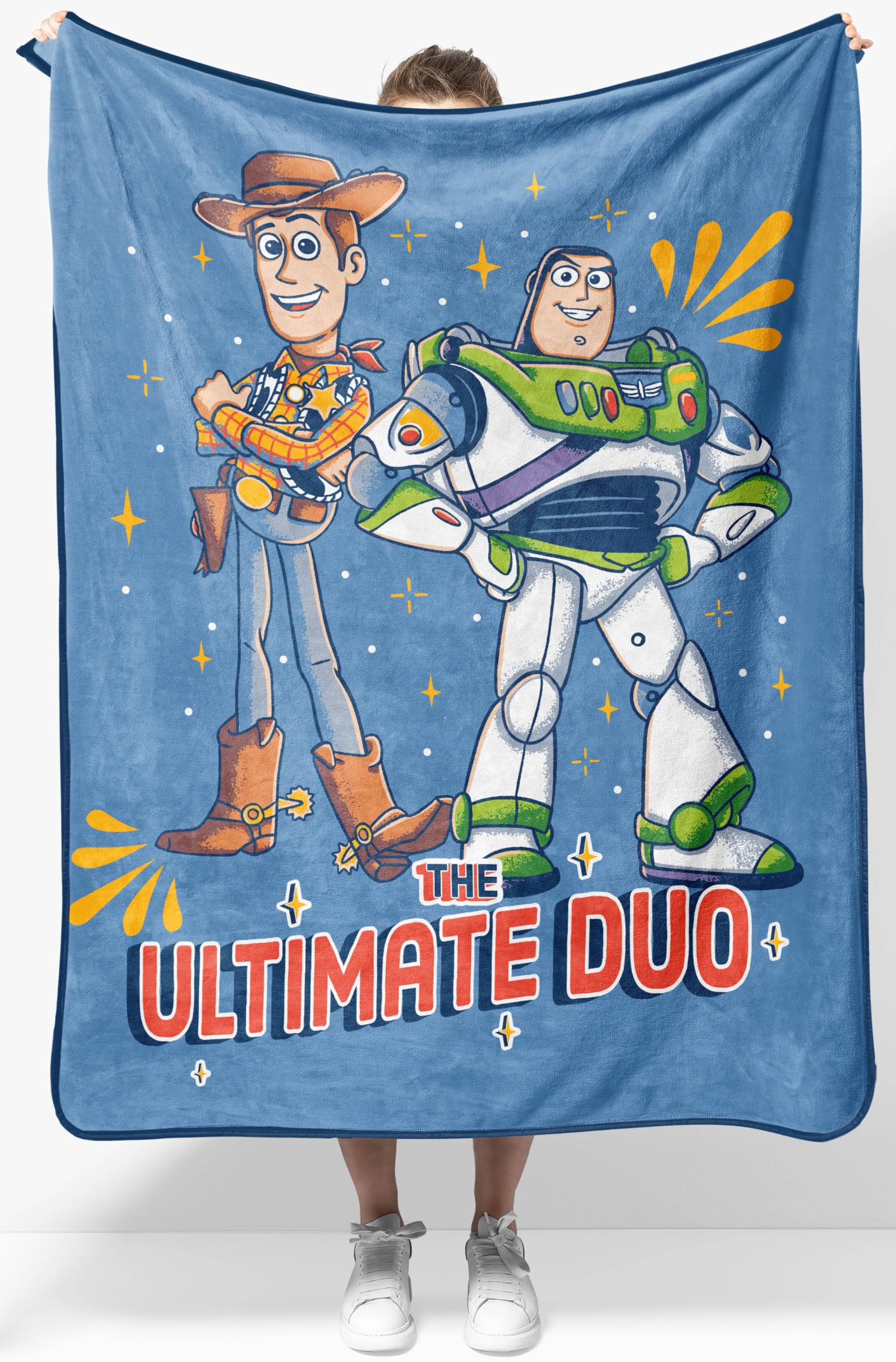 Jay Franco Toy Story throw with Woody and Buzz design for cozy bed moments.