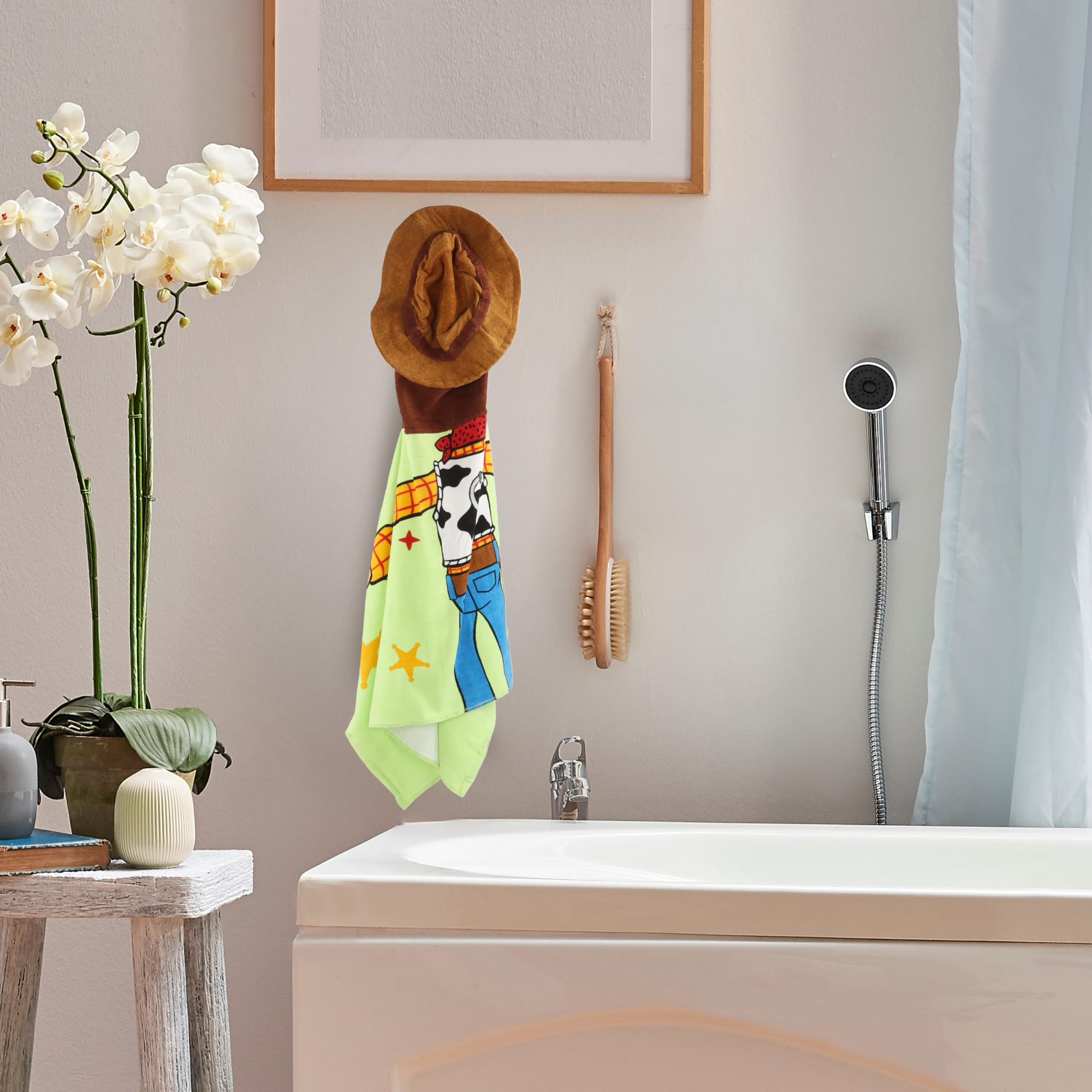 Jay Franco Woody towel in green with denim vest design for kid-friendly styling.