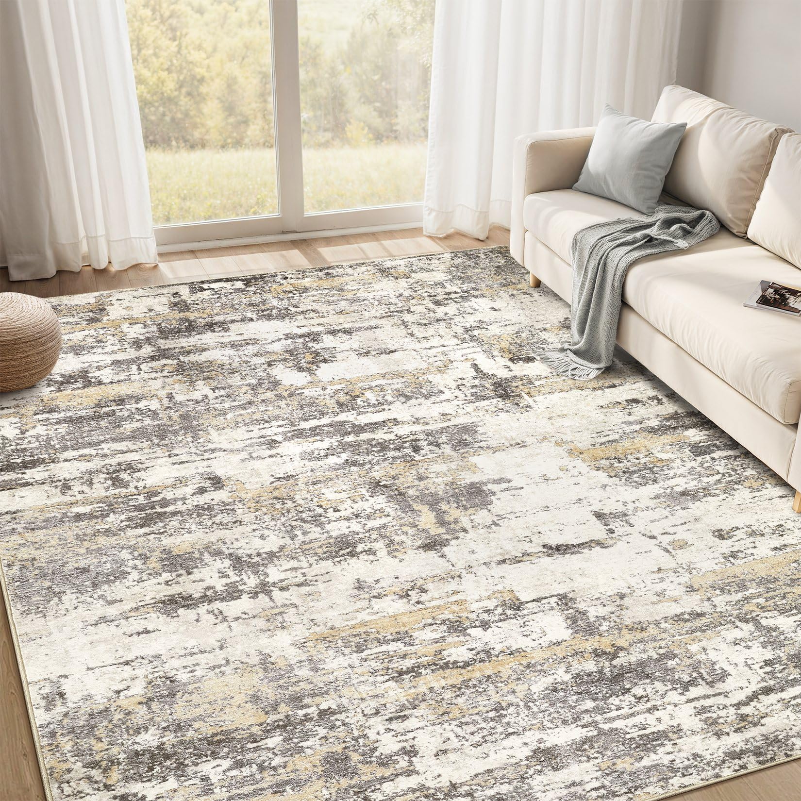 Jessibou area rug with abstract pattern adds a calming focal point to the living room