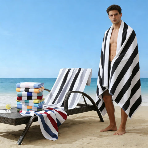 Jessy Home oversized 30x60 towel spread on sand offering full-coverage comfort