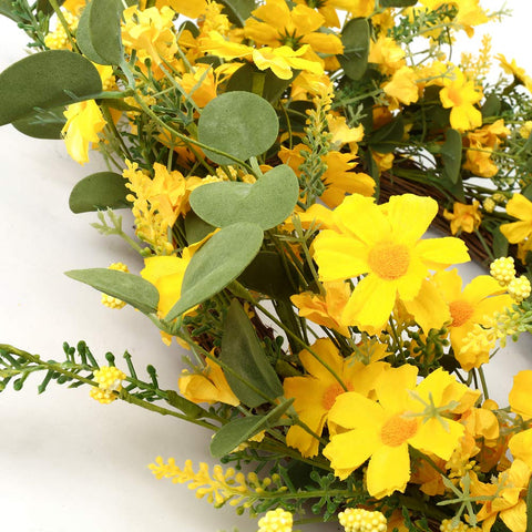 J'FLORU wreath close-up with jasmine, lavender, and daisies for indoor display.