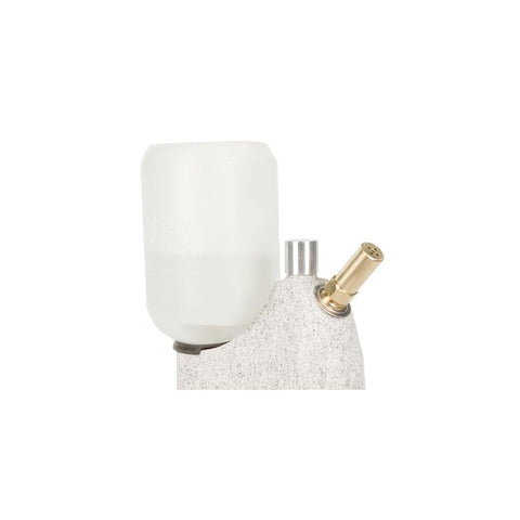 Close-up of Jiffy J-1 hat steamer brass nozzle for precise steam application