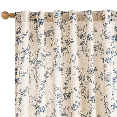 Jinchan 84-inch blue floral curtains on bedroom window for privacy.