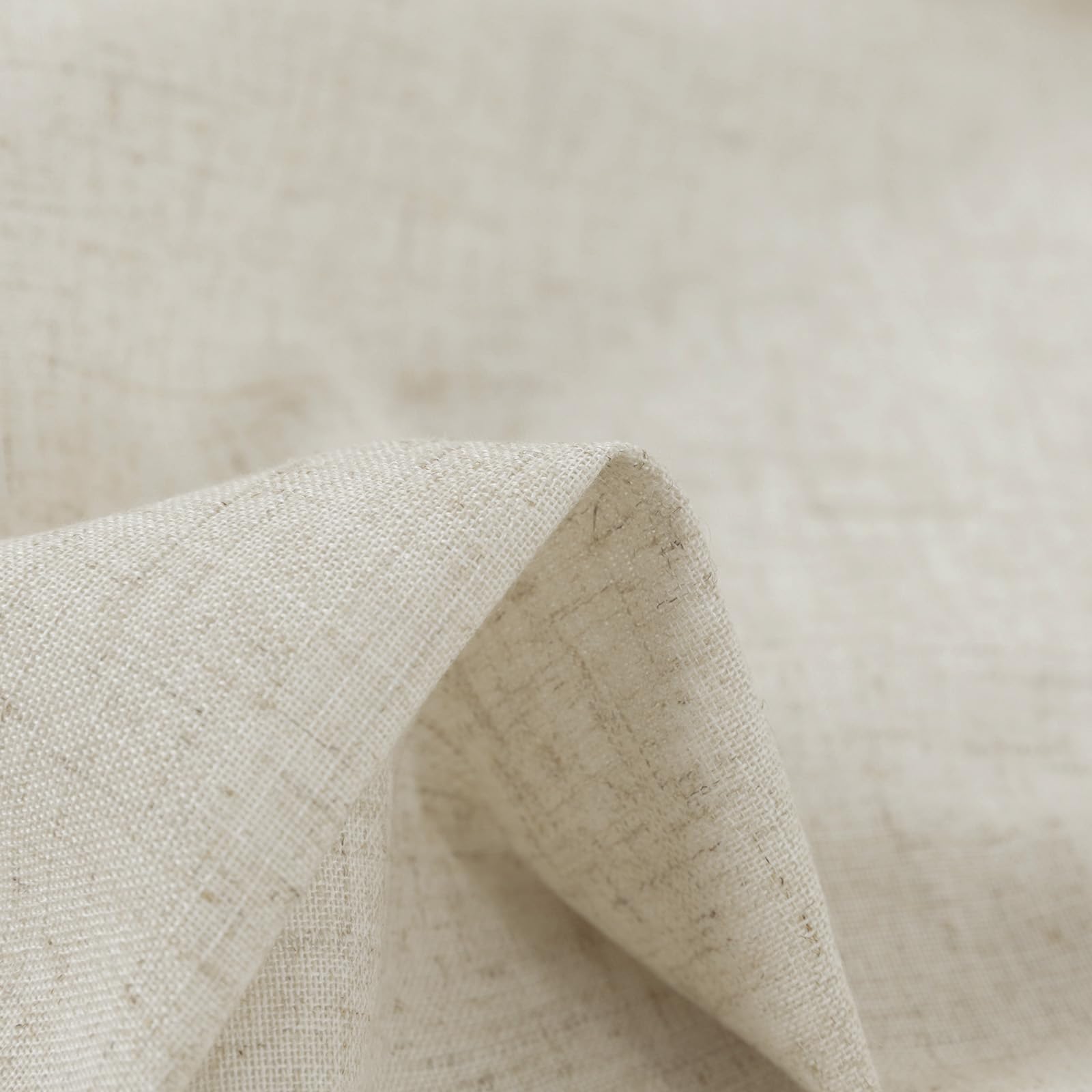 Jinchan beige linen set providing privacy while letting light through in a cozy living room.