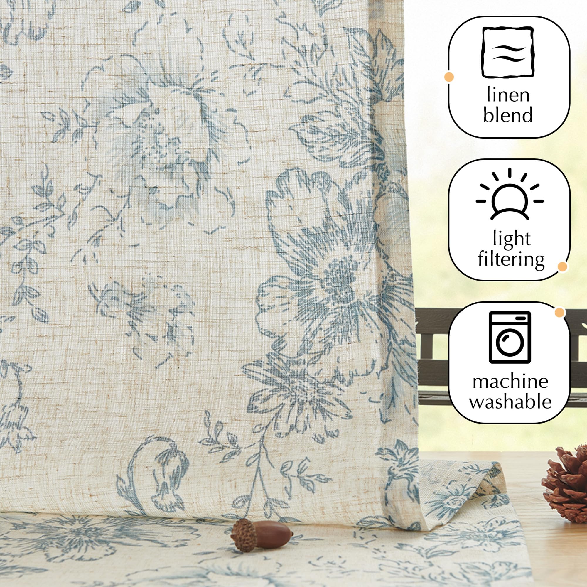 Jinchan bedroom setup with soft light filtering through the blue floral linen panels.
