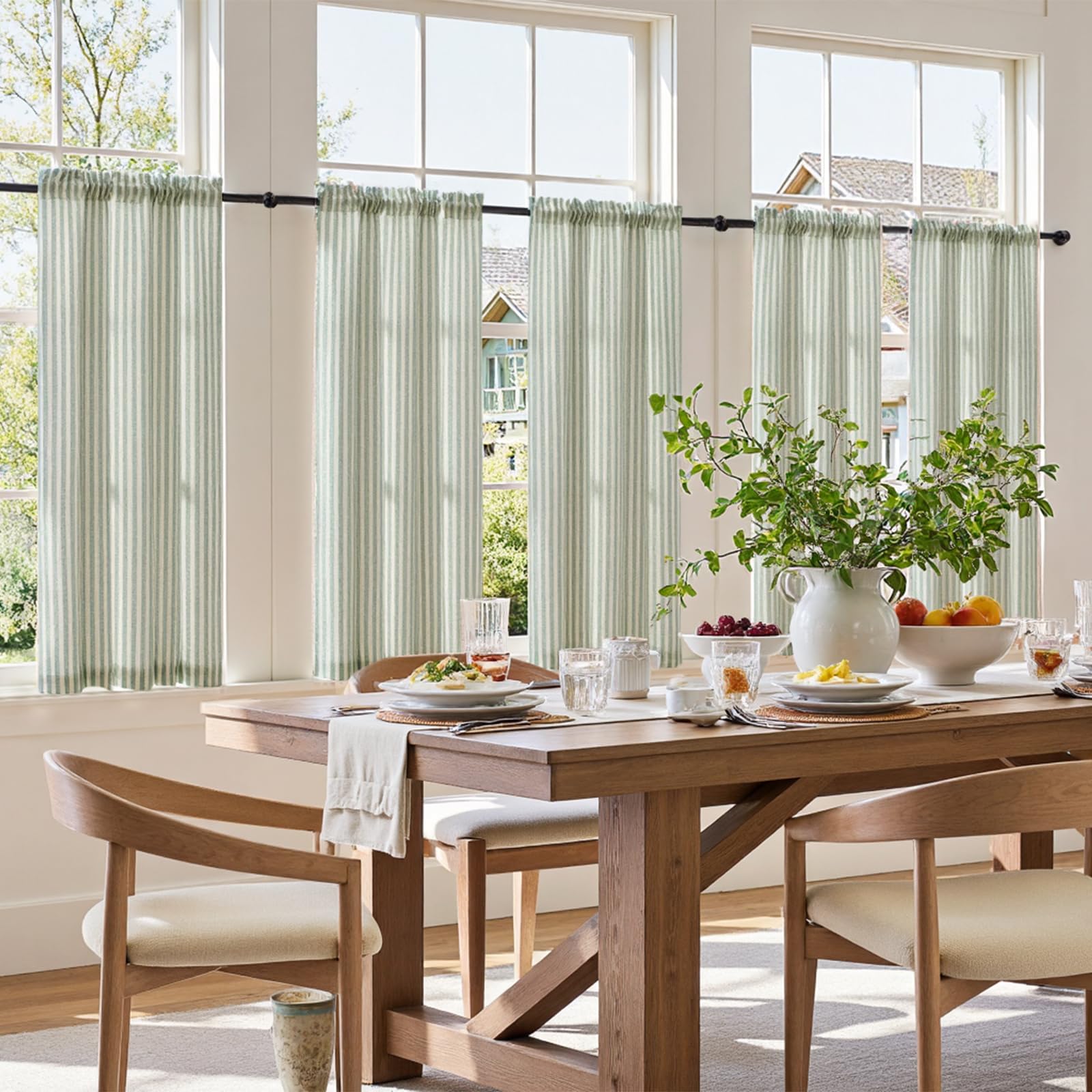 Jinchan light-filtering curtains create sunlit rooms while preserving privacy.