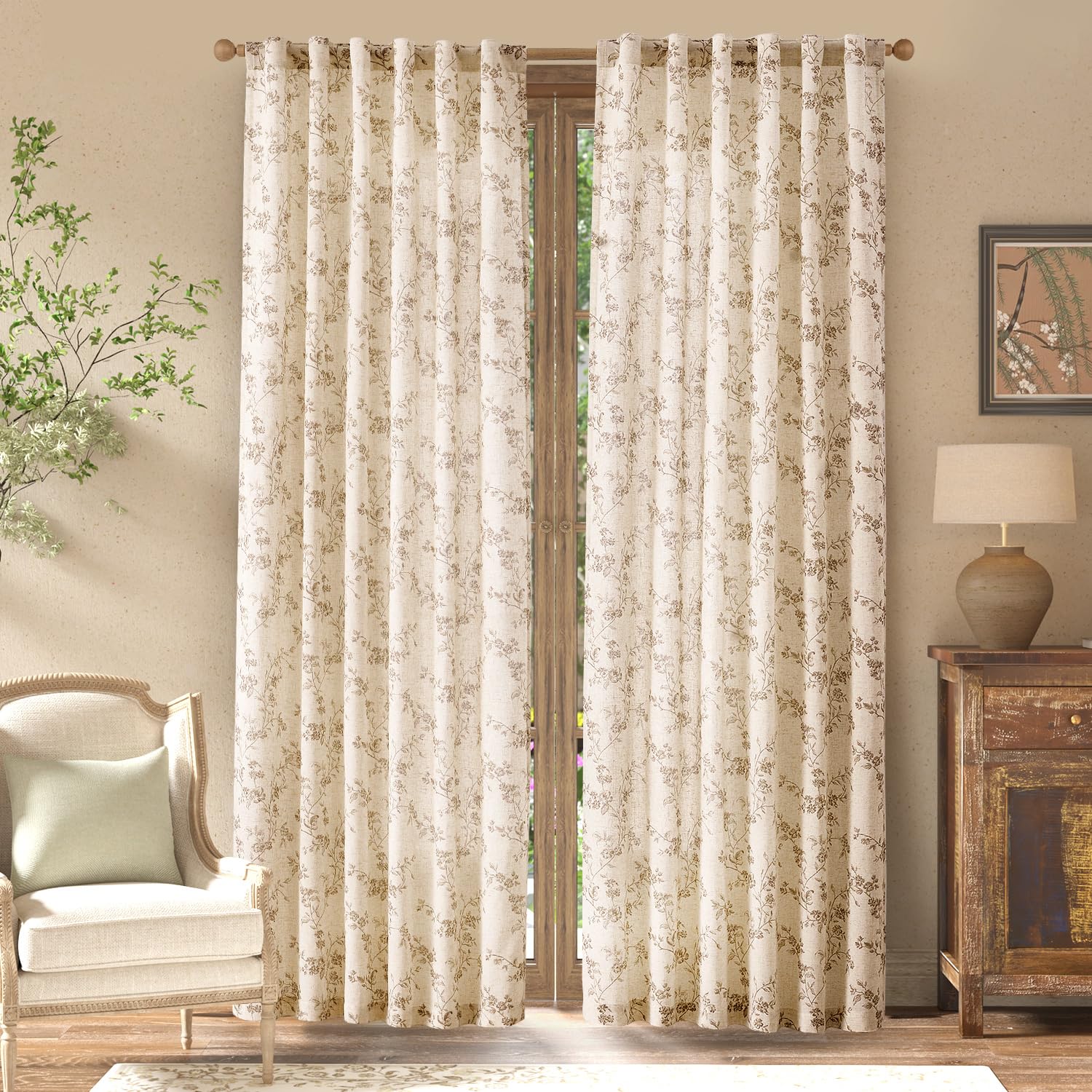 Jinchan close-up of floral linen pattern showing delicate blooms.