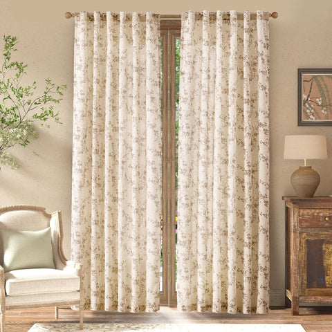 Jinchan close-up of floral linen pattern showing delicate blooms.