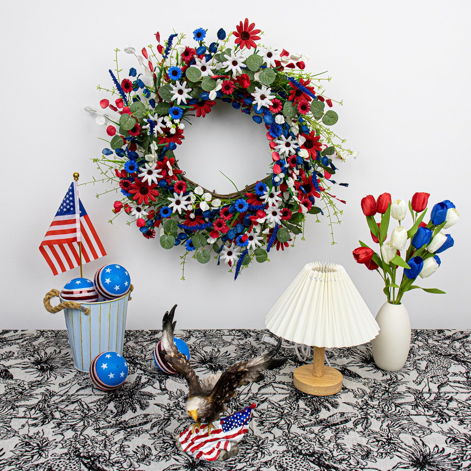 JINGHONG wreath featuring red white and blue daisies for festive curb appeal.