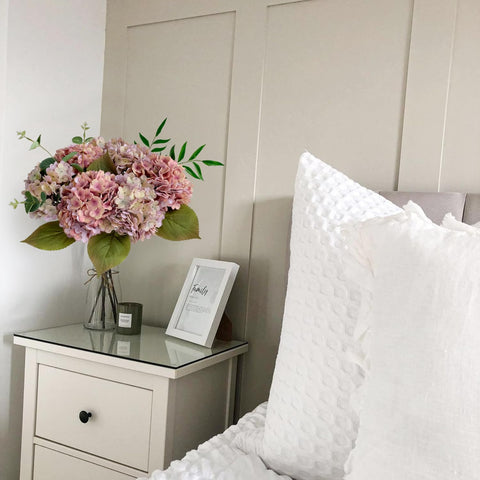JINWOE lifelike hydrangea petals for natural indoor decor.