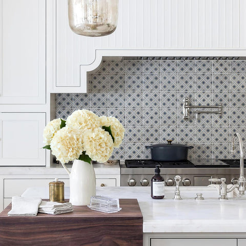 JINWOE 216-petal hydrangea head creates a lush lifelike impression for any room.