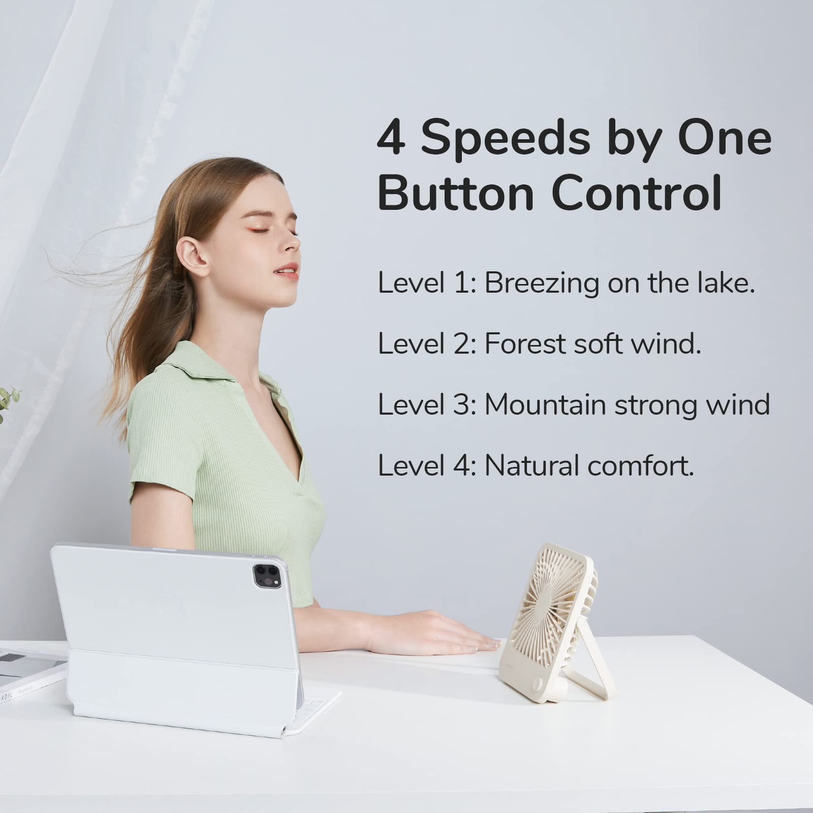 JISULIFE desk fan with 180-degree swivel for easy angle adjustment.