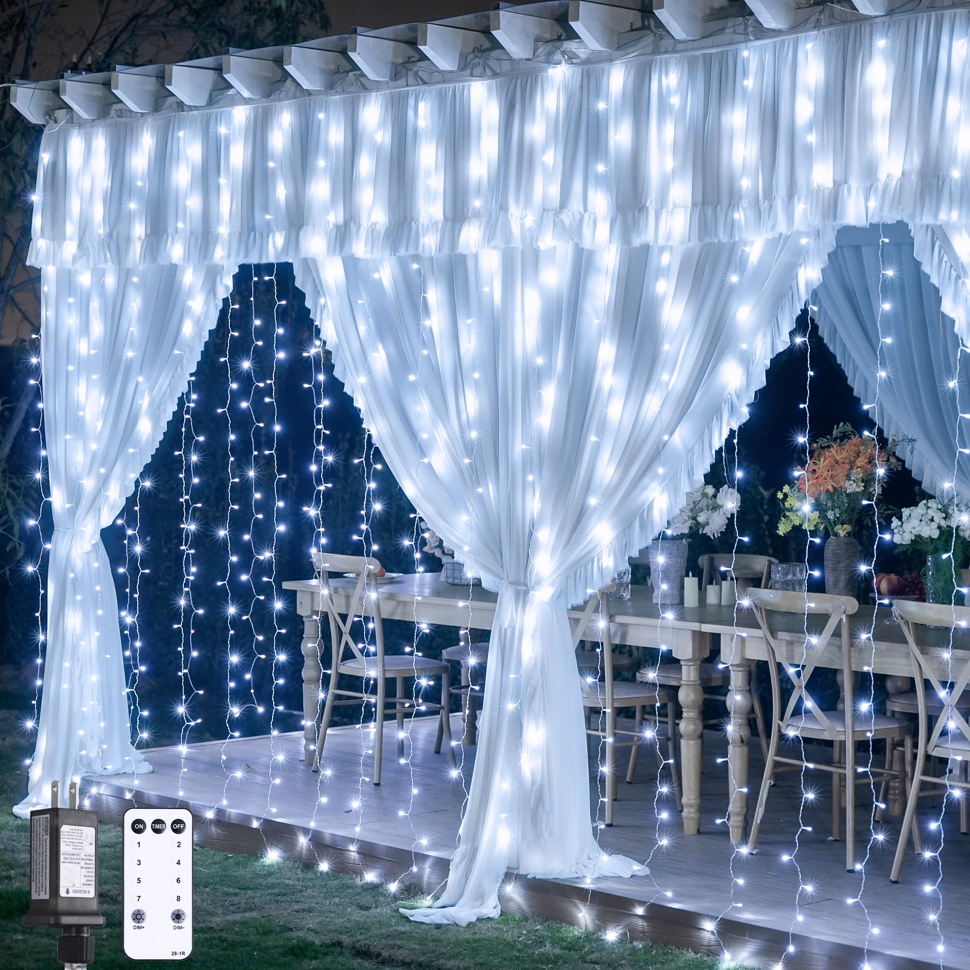 JMEXSUSS 300 LED curtain lights drape a room with warm white glow for cozy ambience.