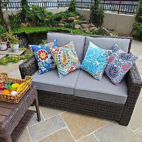 JMGBird outdoor pillow on garden seating with plush support