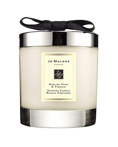 Jo Malone English Pear & Freesia candle close-up showing inviting aroma and luxe design.